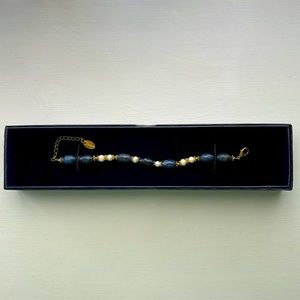 Blue beads and pearl bracelet.